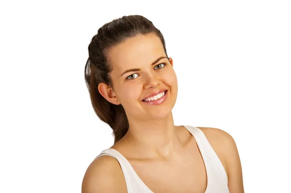 Młoda kobieta uśmiechając się, na białym tle nad białym tle. — Zdjęcie stockowe