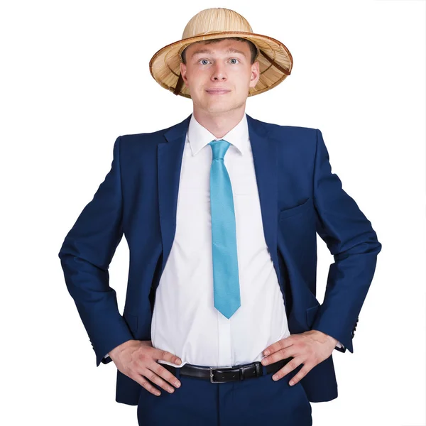 Empresario con traje con sombrero de viaje sonriendo . — Foto de Stock