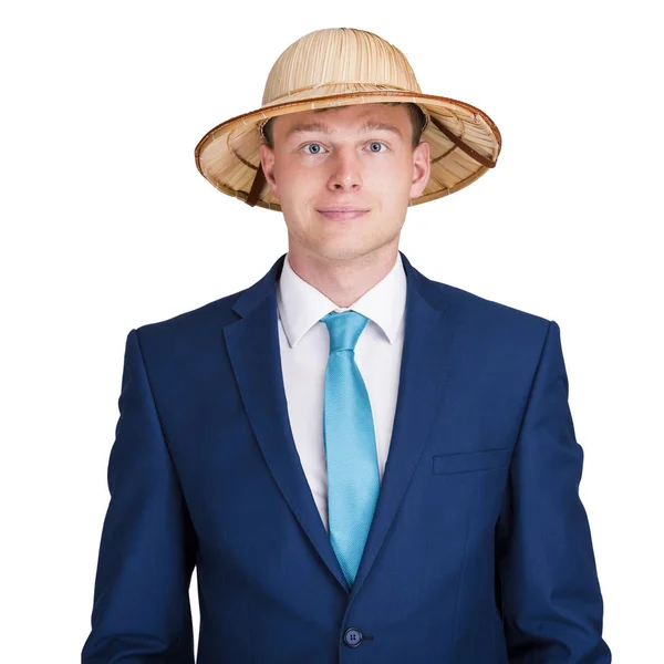 Businessman with suit with travel hat smiling. — Stock Photo, Image