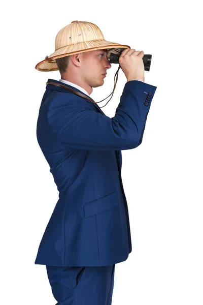 Empresario mirando prismáticos a un lado —  Fotos de Stock
