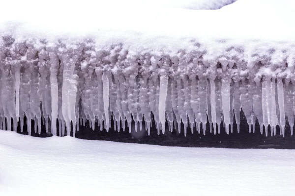Cold winter day with many icicle — Stock Photo, Image