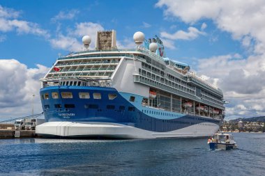 Big cruise ship in harbor Palamos in Spain, Tui Discovery clipart