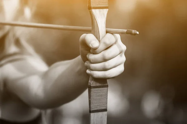 Athlete aiming at a target and shoots an arrow. Archery. — Stock Photo, Image