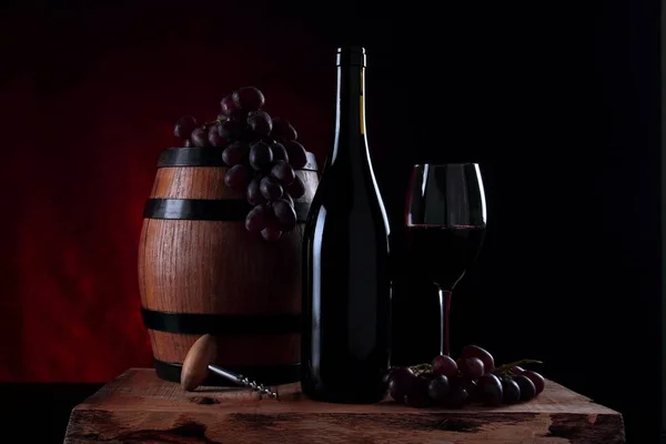 Wood barrel and bottle with wine