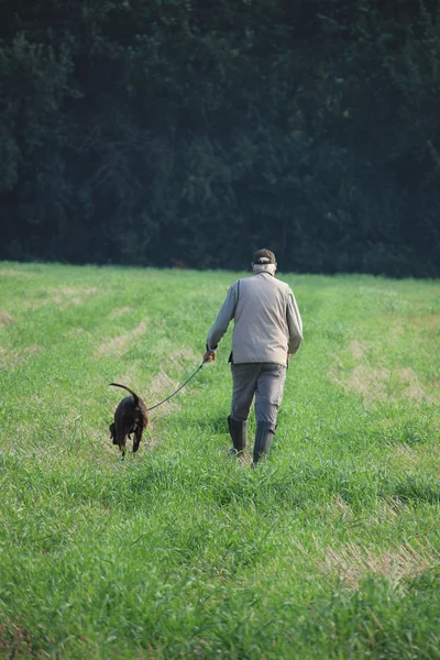 Hunter with dog — Stock Photo, Image