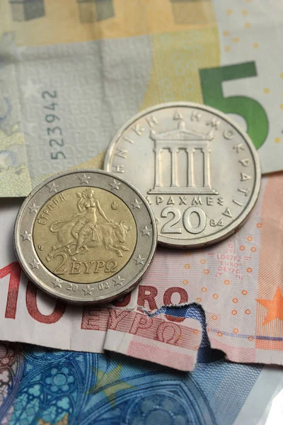 Greek coins on euro notes — Stock Photo, Image