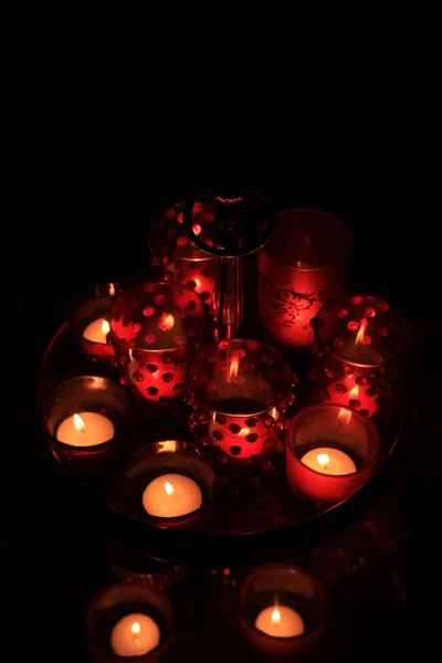 Red votives and candles — Stock Photo, Image