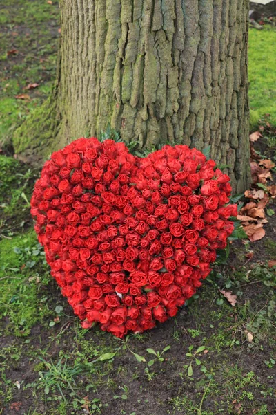 Red Heart sympathy flowers — Stock Photo, Image