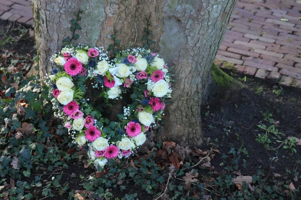 Heart shaped sympathy flowers — Stock Photo, Image