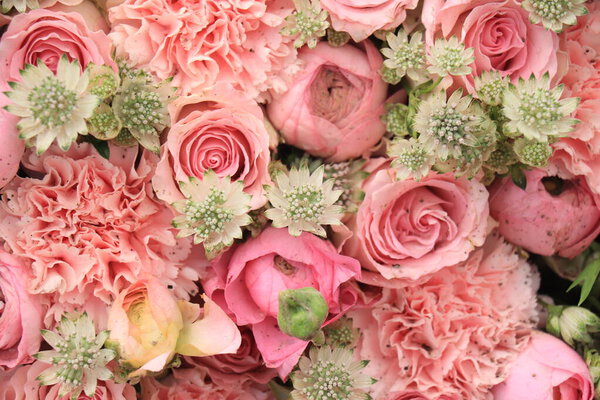 Mixed pink flower arrangement: various flowers in different shades of pink