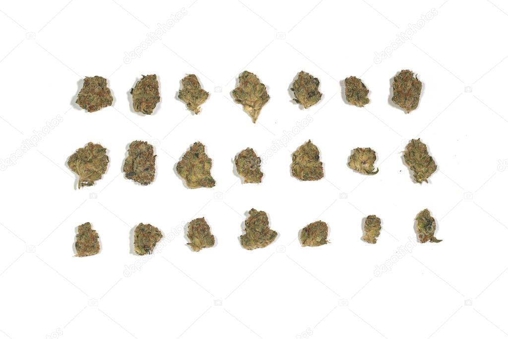 Dried marijuana cannabis weed pot grass flowers buds leaves isolated on white background