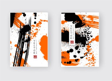 Beyaz arkaplanda siyah turuncu fırça darbesi.