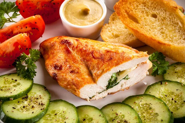 Roasted chicken breast with toasts — Stock Photo, Image