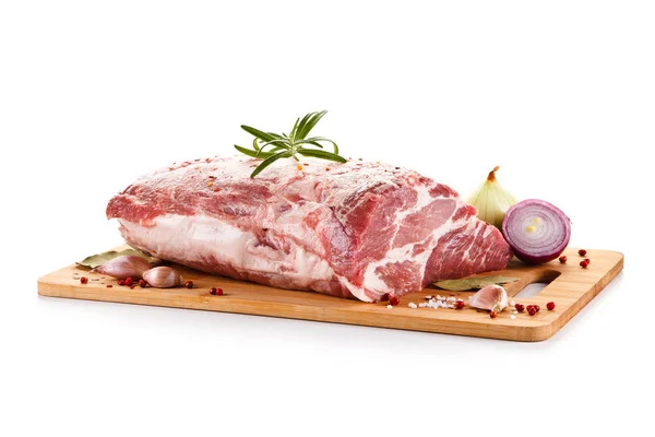 Raw pork on cutting board — Stock Photo, Image