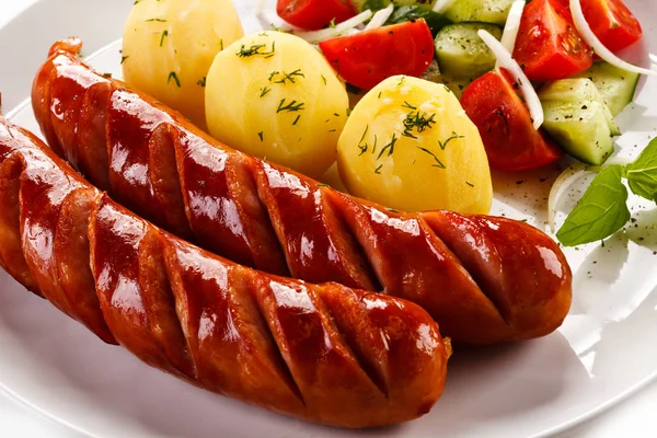 Grilled sausages and vegetables — Stock Photo, Image