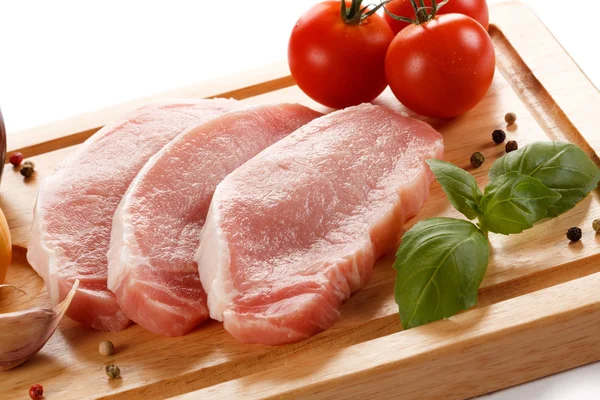 Raw Pork Chops Cutting Board Vegetables — Stock Photo, Image