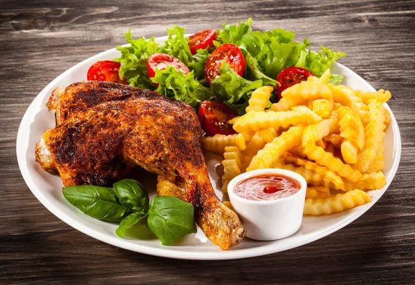 Roast chicken leg with french fries