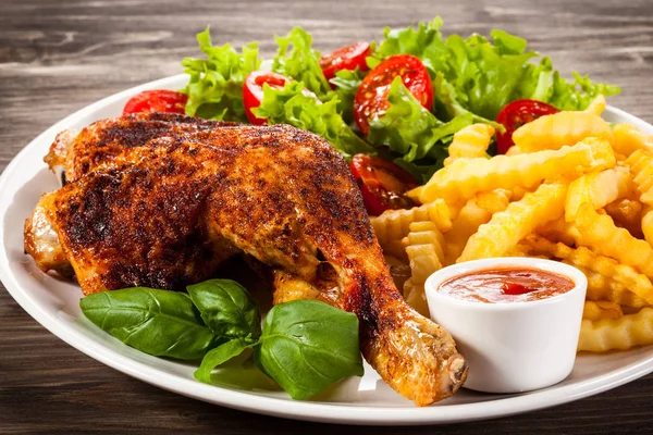 Roast chicken leg with french fries