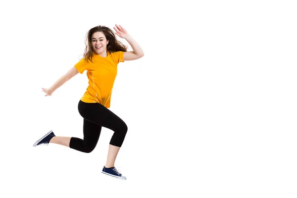Mujer Joven Saltando Sobre Fondo Blanco —  Fotos de Stock
