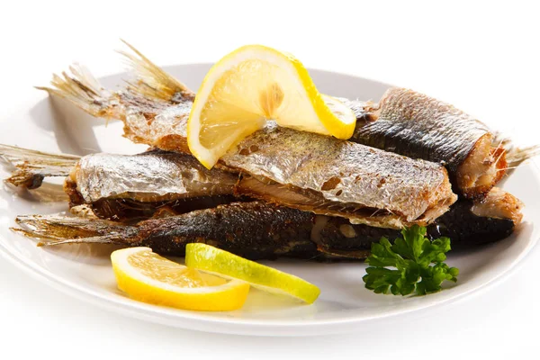 Fried herrings on white background — Stock Image Fried Herrings White Background Royalty Free Stock Images