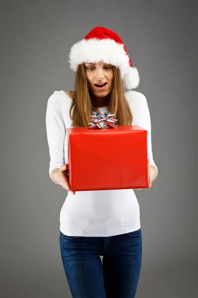 Woman Santa Hat Holding Gift Winter Holidays — Stock Photo, Image