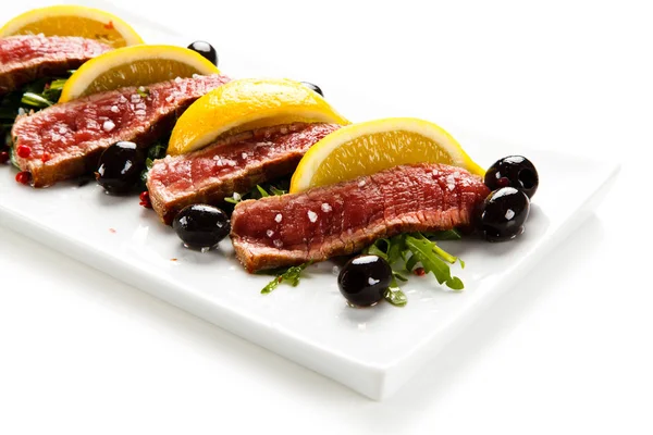 Sliced Beef Steak Olives Lemons — Stock Photo, Image