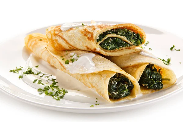 Pancakes Stuffed Spinach Served White Plate Sour Cream — Stock Photo, Image