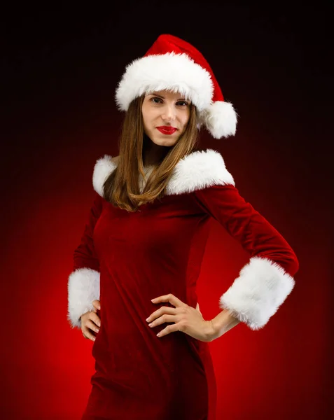 Vrouw Santa Hoed Poseren Studio — Stockfoto