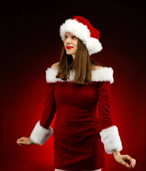 Stüdyoda Poz Veren Noel Baba Şapkalı Kadın — Stok fotoğraf