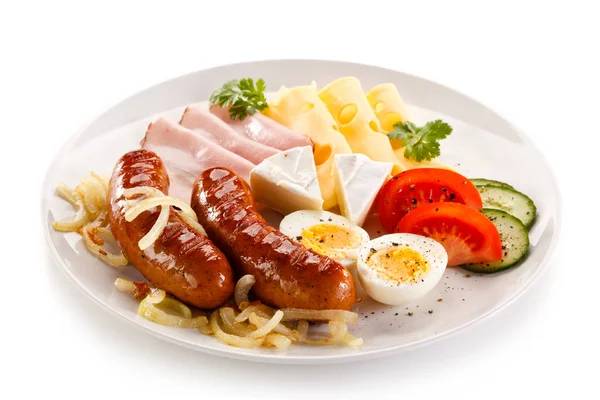 Fried Sausages Sliced Ham Cheese Eggs Vegetables — Stock Photo, Image