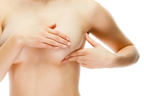 若い裸の女性チェック胸 ストック画像
