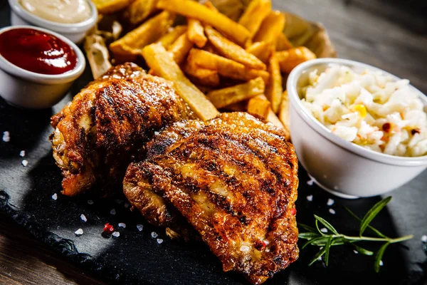 Chicken Thighs French Fries Vegetables Sauces — 스톡 사진