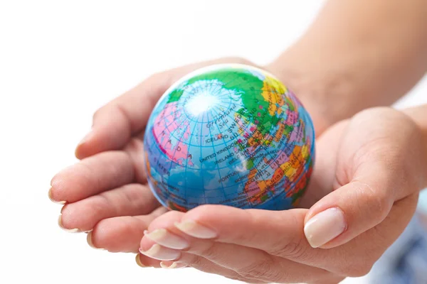 Woman's hand with globe — Stock Photo, Image