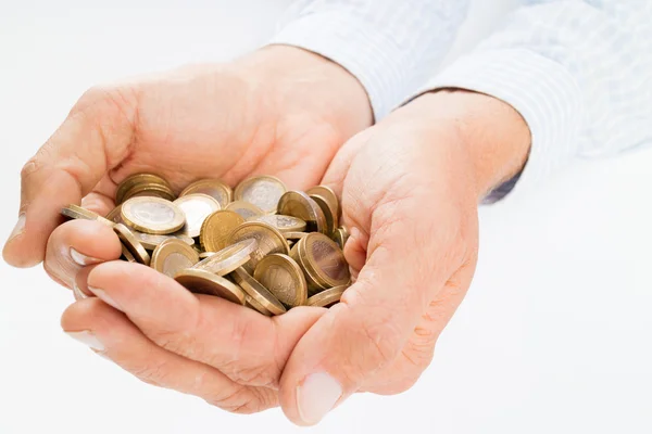 Hands holding euro coins — Stock Photo, Image