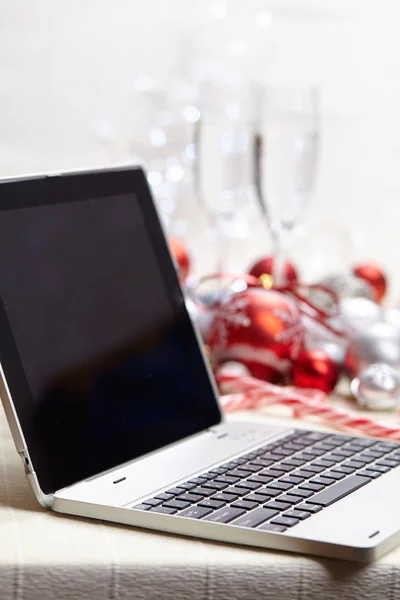 Laptop with Christmas toys — Stock Photo, Image