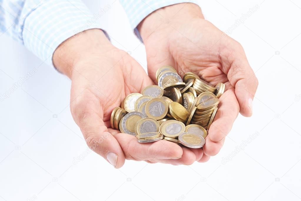 hands with euro coins