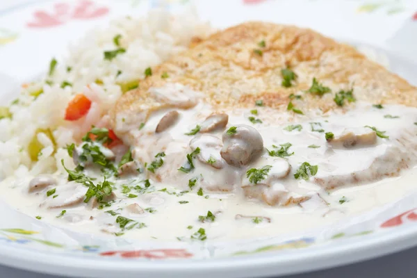 Tasty schnitzel with rice — Stock Photo, Image