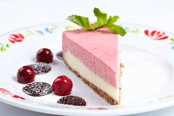 Tasty cheesecake in the plate — Stock Photo, Image