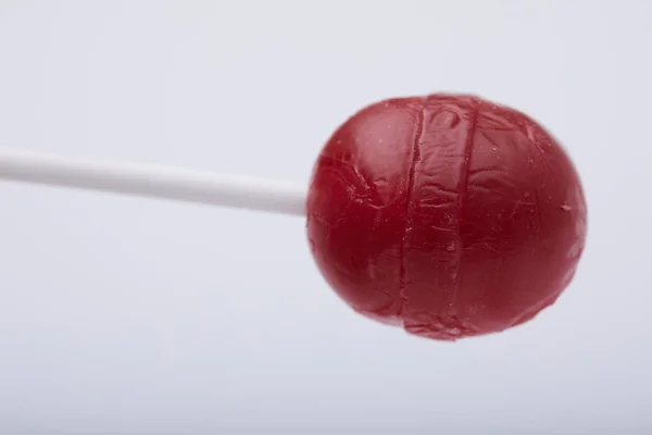 Röd lollipop godis — Stockfoto