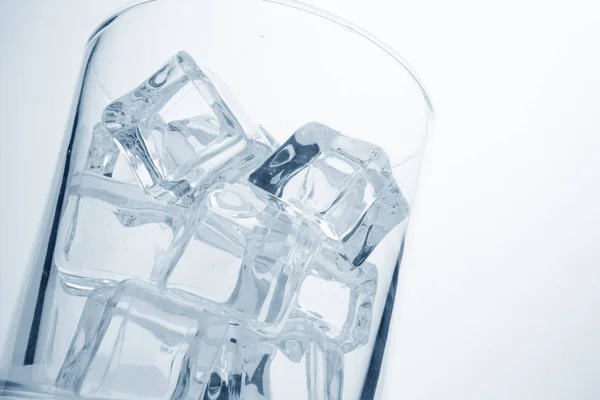 Glass with ice cubes — Stock Photo, Image