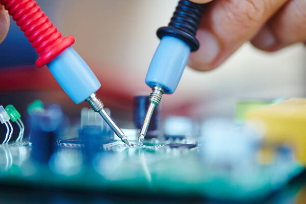 man working in electronic laboratory