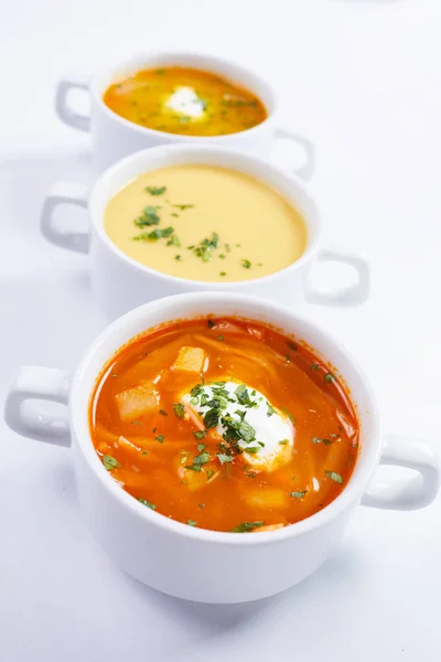 Different soup in the cups — Stock Photo, Image