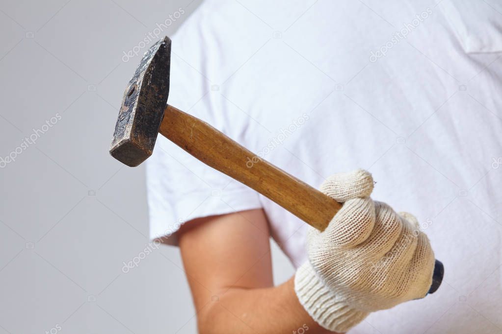 man working with  hammer