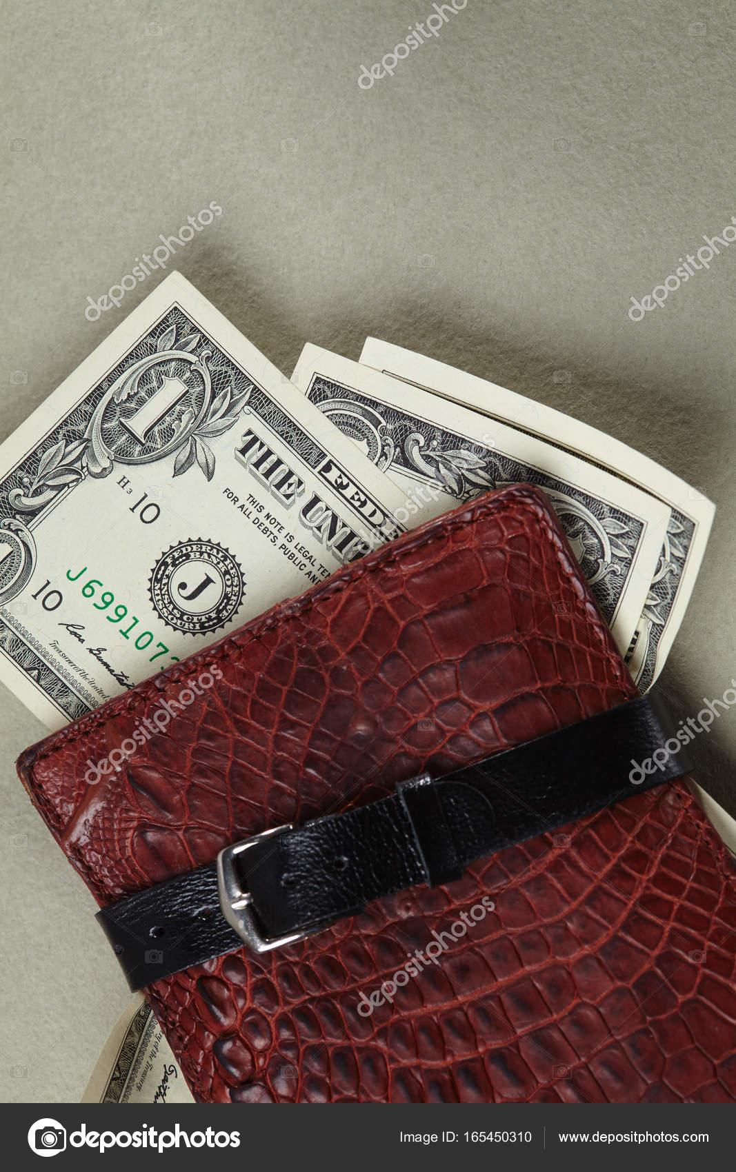 Wallet with money wrapped with belt — Stock Photo © strelok #165450310