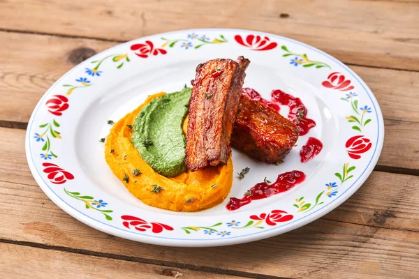 tasty grilled ribs with pumpkin puree