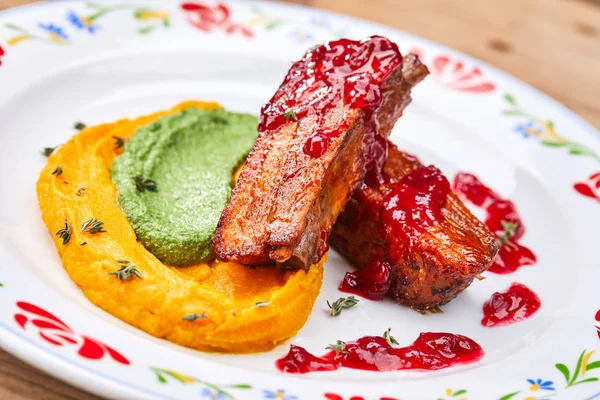 tasty grilled ribs with pumpkin puree