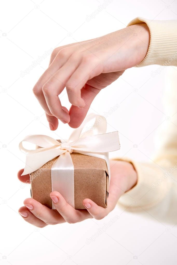 hand holding handmade gift box, close-up