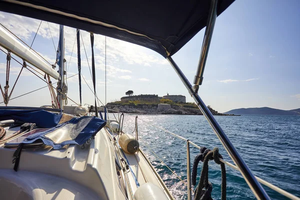 yacht floating in sea at sunny day