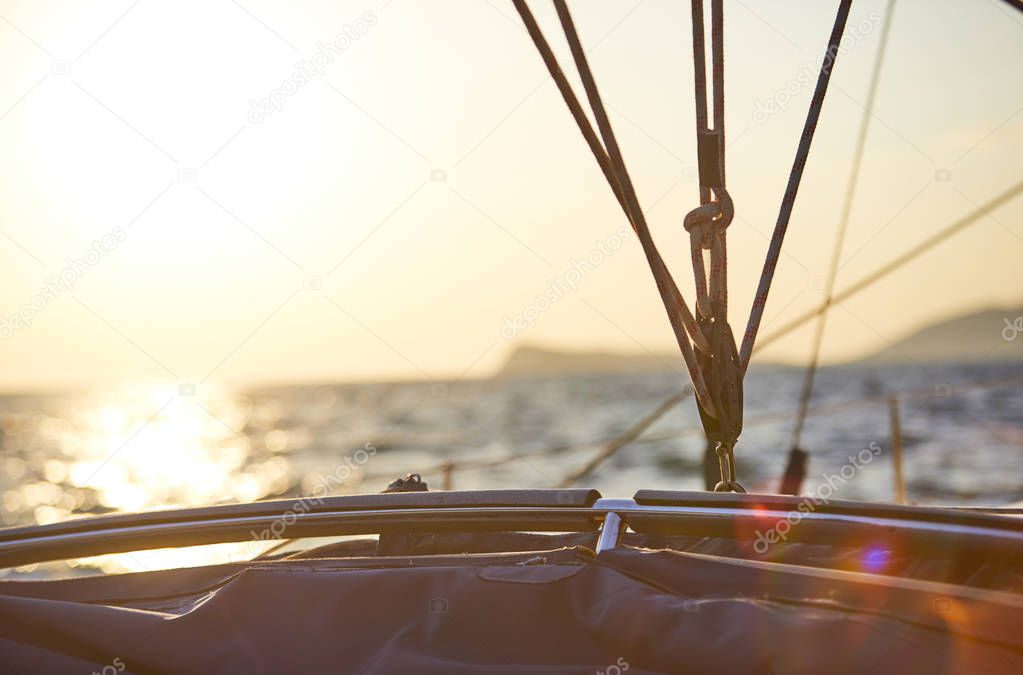 picturesque view of beautiful summer sunset on yacht