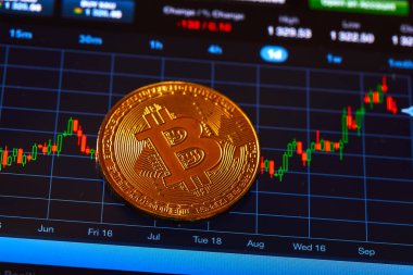 arka plan üzerinde grafik ile altın bitcoin , kripto para için kavramsal görüntü